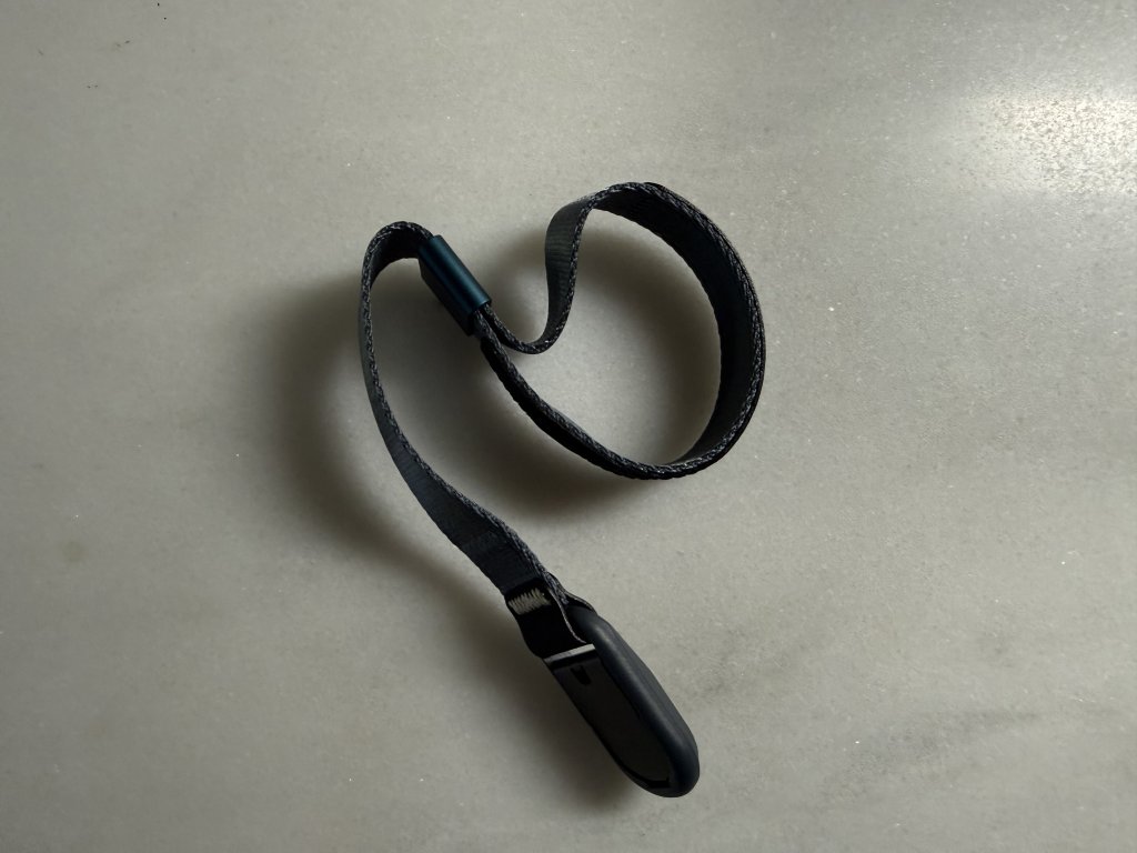 Peak Design Cuff wrist strap — a slim black wrist strap with quick-release anchor